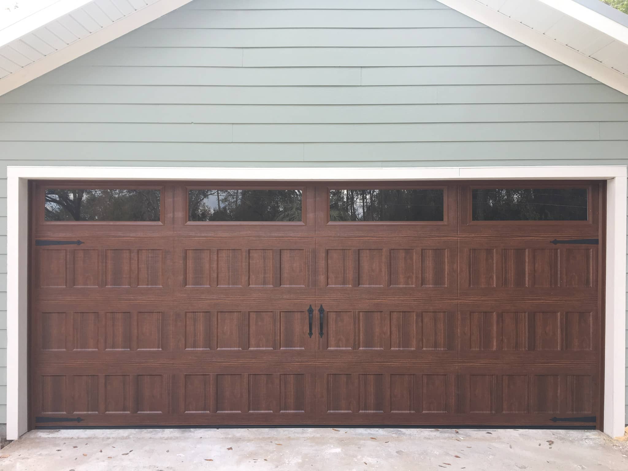 garage door spring adjustment or repair