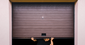 Is it cheaper to repair or replace a garage door?